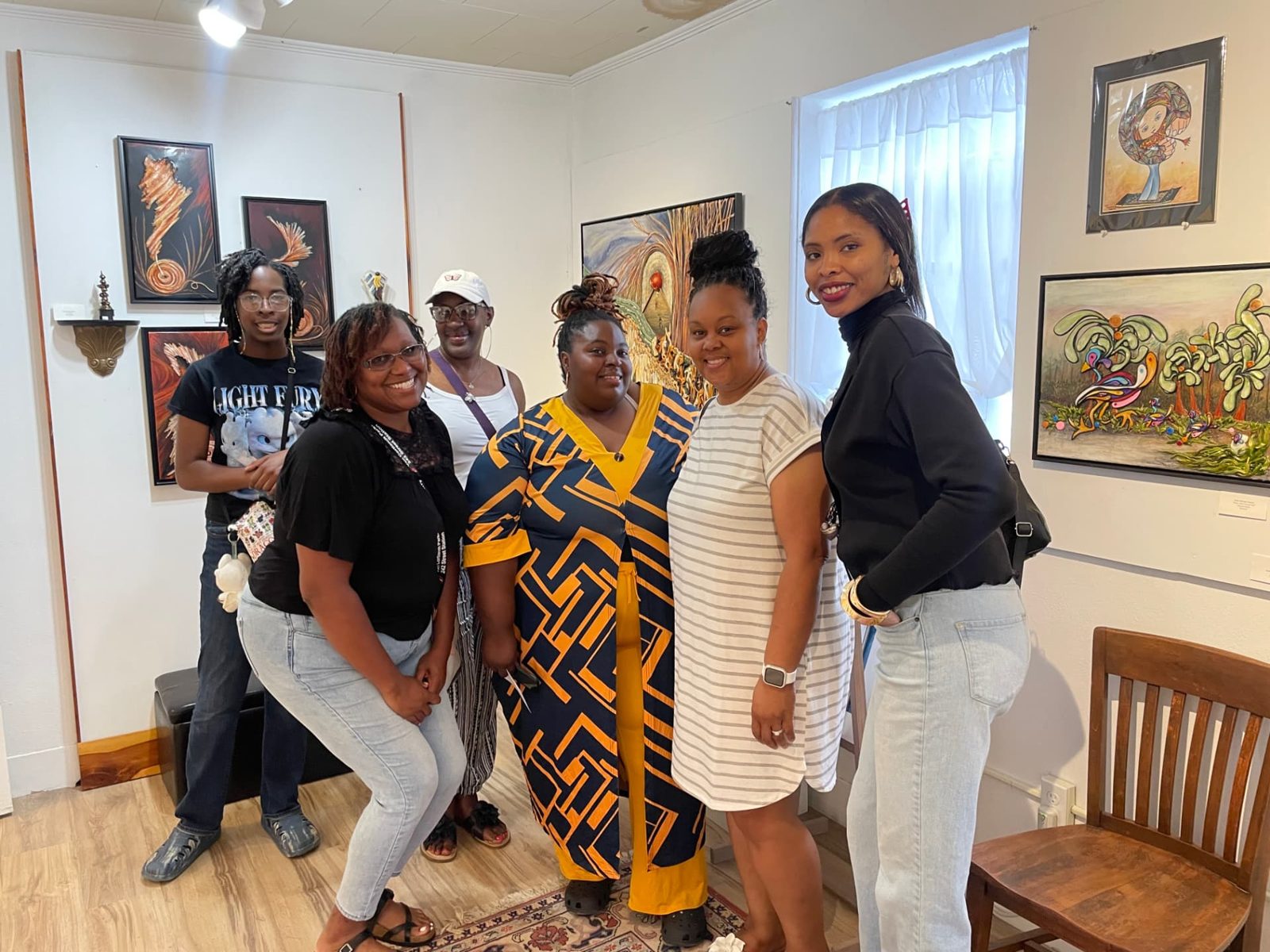 Women of Daughters of the King smiling together during a ministry outing.